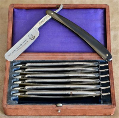 Lot 182 - A set of seven George Butler & Co., Sheffield cut-throat razors with horn handles, each named...