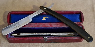 Lot 184 - A pair of J.H. Andrew & Co., Sheffield cut-throat razors with horn handles, each numbered on...
