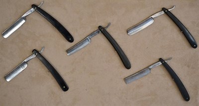 Lot 187 - A group of five horn handled cut-throat razors with Sheffield blades comprising; Frederick...