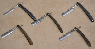 Lot 188 - A group of five horn handled cut-throat razors with Sheffield blades comprising;Wheat Sheaf 'WUTZ'