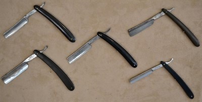 Lot 193 - A group of five cut-throat razor blades comprising; F. T. Long, Oxford, with horn handle, Joh....