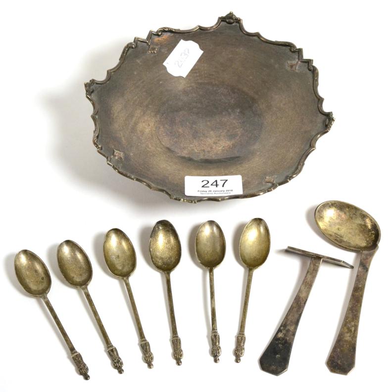 Lot 247 - A silver comport, by Walker & Hall, Sheffield 1939, shaped rim, footed base; together with a set of