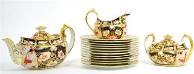 Lot 1 - A Royal Crown Derby Imari teapot, cream, sugar and plates (15)
