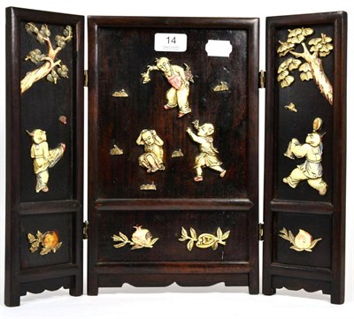 Lot 14 - A Chinese hardwood three fold table screen with carved bone decoration