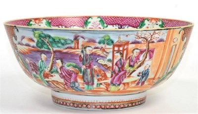 Lot 30 - A Chinese porcelain punch bowl, Qianlong, painted in the Mandarin palette with figures in...