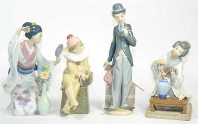 Lot 39 - Two Lladro figures of geishas and two further Lladro figures