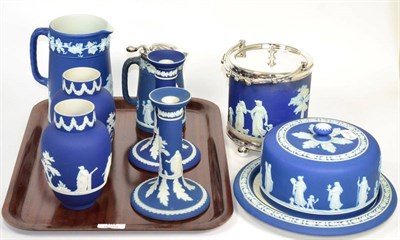 Lot 66 - A collection of Wedgwood and similar blue and white Jasperware, including a biscuit barrel with...