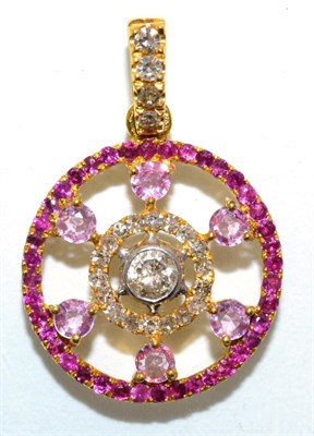 Lot 81 - A diamond, ruby and pink sapphire pendant, a central round brilliant cut diamond in a rubbed...
