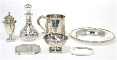 Lot 84 - A group of silver including christening mug; salt and matching pepperette; a photograph frame;...