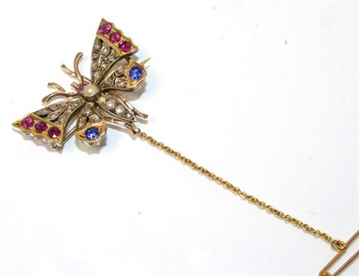 Lot 95 - A multi-gemstone butterfly brooch, with a pearl set body, ruby set eyes and wings set with rose cut