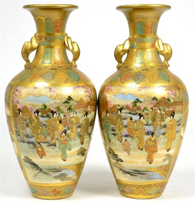 Lot 130 - A pair of Japanese Satsuma twin handled vases