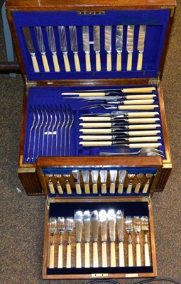 Lot 148 - An oak canteen of silver plated flatware, together with an oak cased set of early 20th century...
