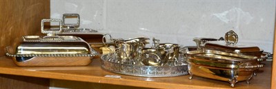 Lot 159 - A silver sauce boat; a George III silver caddy spoon; and a silver toast rack; together with a...