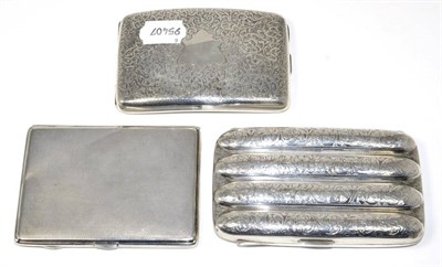 Lot 201 - A silver cigar case and two silver cigarette cases