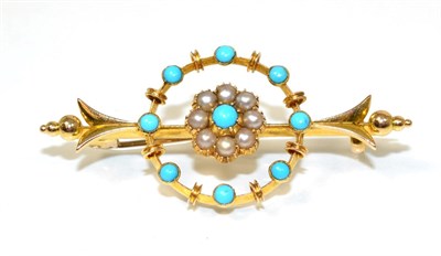 Lot 218 - An early twentieth century turquoise and seed pearl brooch, a central turquoise within a border...