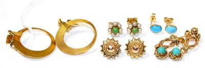 Lot 228 - A pair of 9 carat gold hoop earrings, as engine turned disks suspended from a bail and a square...