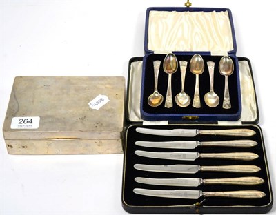 Lot 264 - A silver cigarette box, Birmingham marks; a cased set of silver teaspoons and a cased set of silver