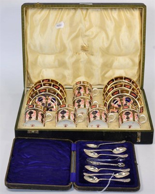 Lot 272 - A cased set of six Royal Crown Derby Imari palette coffee cans and saucers; together with a set...