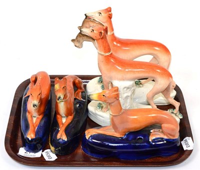 Lot 274 - Two pairs of Staffordshire greyhounds, one pair with game in their mouths, the other pair recumbent