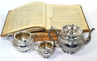 Lot 283 - Three 18th century volumes of sheet music and a three piece silver plated tea service