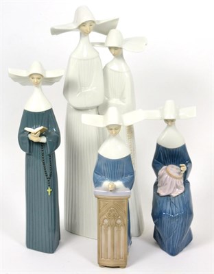 Lot 310 - Four Lladro nun figures, 'Mediation', 'Prayerful Moment', 'Time to Sew' and 'Nuns', all boxed (4)