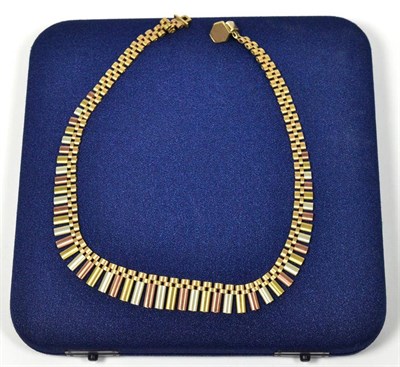 Lot 347 - A 9 carat tri-colour gold fringe necklace, of graduated alternating matt polished yellow, rose...