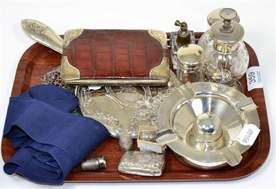 Lot 359 - A selection of silver items consisting of ashtray, vesta case, hand mirror, silver belt buckle,...