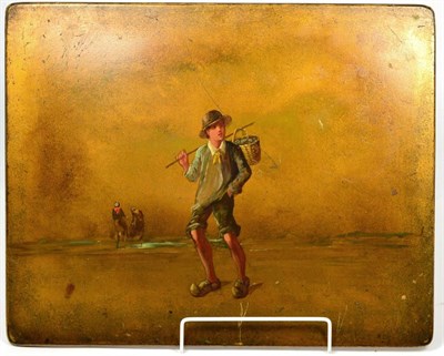 Lot 372 - A papier mache panel painted with a Dutch fisherboy in oils