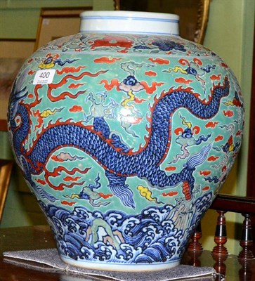 Lot 400 - A large Chinese porcelain vase decorated with dragons and flaming pearls on a sea green ground