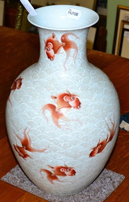 Lot 402 - A Chinese porcelain carved vase decorated with fish