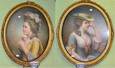 Lot 1040 - English School, a pair of pastel portraits of ladies, in oval gilt frames