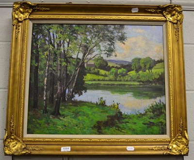 Lot 1084 - Arthur Bateman (20th century), trees by a lake, oil on canvas, (relined), signed and dated...