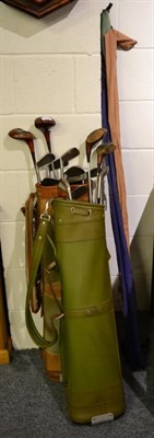 Lot 1124 - Golf clubs in bags and fishing rods