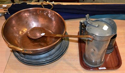 Lot 1156 - A collection of pewter chargers, measures and tankards; together with a copper bowl and sieve