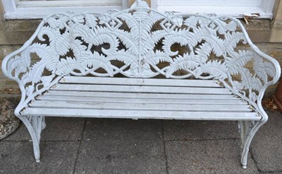 Lot 1166 - A Coalbrookdale style white painted cast metal fern pattern garden bench