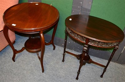 Lot 1179 - A mahogany oval occasional table decorated with pierced fretwork and joined by stretchers, together