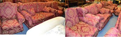 Lot 1180 - A Kirkdale red and gold upholstered eight piece suite comprising a three seater sofa, a pair of...