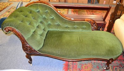 Lot 1193 - A mahogany framed sofa with mustard coloured upholstery