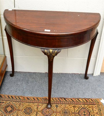 Lot 1209 - A mahogany D-shaped fold over card table