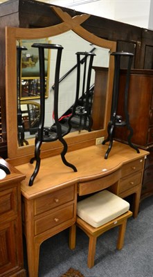 Lot 1210 - A large lined oak mirrored dressing table and matching stool