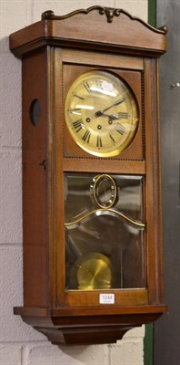 Lot 1244 - A mahogany drop dial wall clock