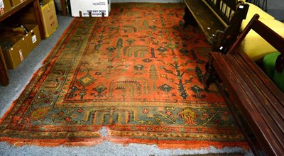 Lot 1252 - Ushak carpet, West/Central Anatolia, the terracotta field of stylised plants enclosed by mint green