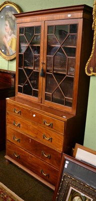 Lot 1270 - A late George III mahogany and boxwood straight front chest, circa 1800, with four long...