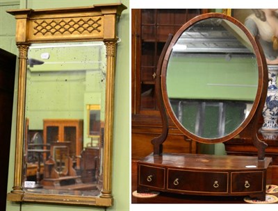 Lot 1274 - A giltwood inverted break front mirror, together with a mahogany toilet mirror