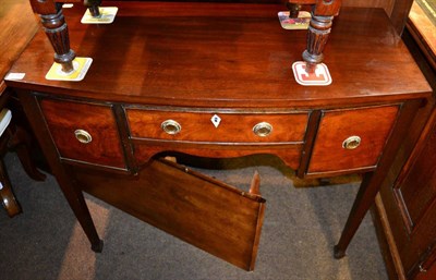 Lot 1289 - A small 19th century mahogany bow fronted sideboard fitted with three drawers