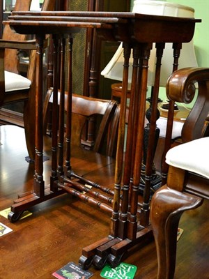 Lot 1292 - A set of three Regency rosewood nesting tables with spindle legs