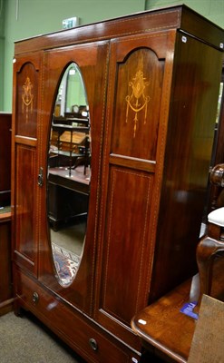 Lot 1293 - An Edwardian inlaid mahogany mirror fronted wardrobe