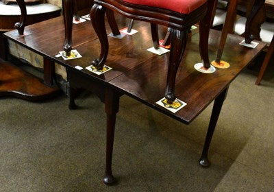 Lot 1300 - A 19th century mahogany gateleg table