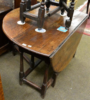 Lot 1307 - An 18th century oak gateleg table