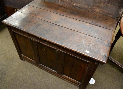 Lot 1308 - A panelled oak coffer